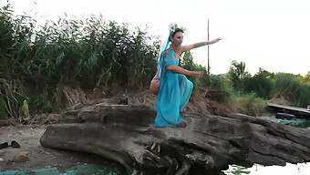 Bikini-Clad College Girl Dances On The Beach At Dusk